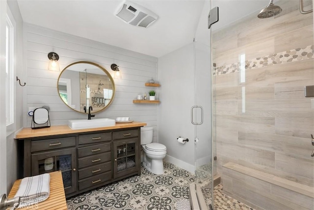 31852 Via Faisan, Coto De Caza, CA 92679 - full bath with toilet, a shower stall, wood walls, vanity, and tile patterned floors