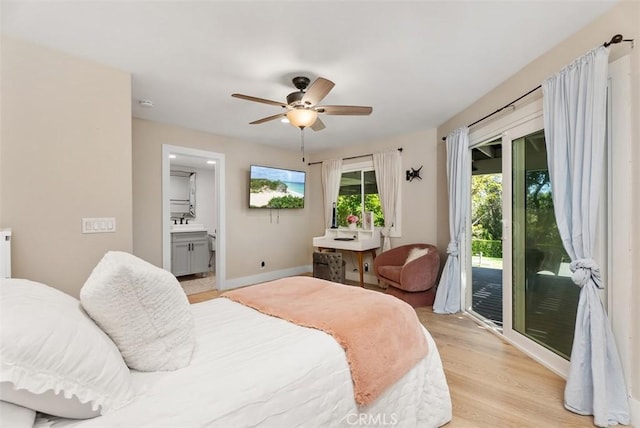 31852 Via Faisan, Coto De Caza, CA 92679 - bedroom featuring access to exterior, light wood finished floors, a ceiling fan, ensuite bath, and baseboards