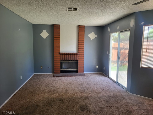 1616 Bluebell St, Lancaster, CA 93535 - unfurnished living room with carpet, a fireplace, a textured ceiling, and baseboards
