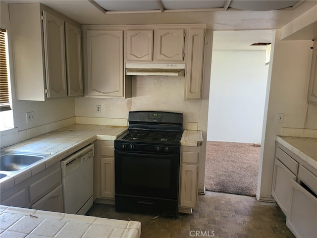1616 Bluebell St, Lancaster, CA 93535 - kitchen featuring under cabinet range hood, dishwasher, black gas range, tile countertops, and a sink