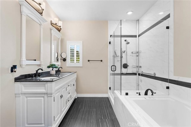 1271 N Tulare Way, Upland, CA 91786 - bathroom featuring baseboards, a shower stall, a garden tub, and double vanity