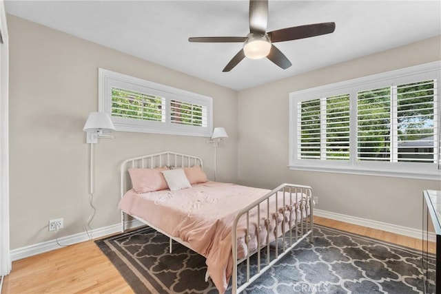 1271 N Tulare Way, Upland, CA 91786 - bedroom with baseboards, wood finished floors, and a ceiling fan