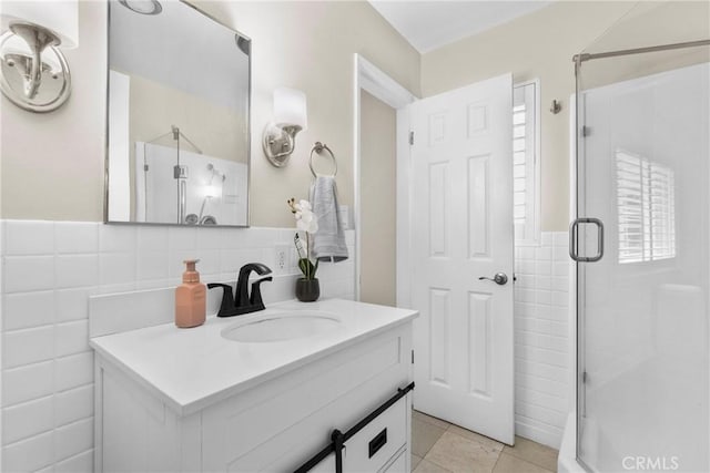 1271 N Tulare Way, Upland, CA 91786 - bathroom featuring tile walls, a shower stall, vanity, and tile patterned floors