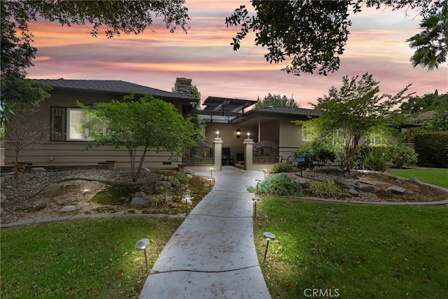 1271 N Tulare Way, Upland, CA 91786 - view of front of property with a lawn and a chimney