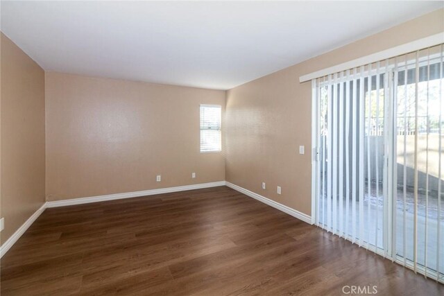 200 E Alessandro Blvd Unit 97, Riverside, CA 92508 - unfurnished room featuring baseboards and dark wood-type flooring