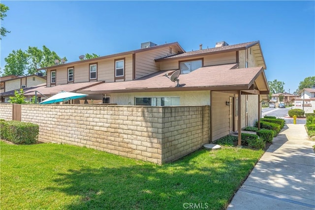 2142 S Mountain Ave, Ontario, CA 91762 - rear view of property with a chimney and roof with shingles