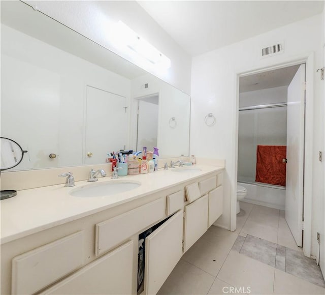 2142 S Mountain Ave, Ontario, CA 91762 - bathroom with toilet, double vanity, shower / bath combination with glass door, and tile patterned flooring