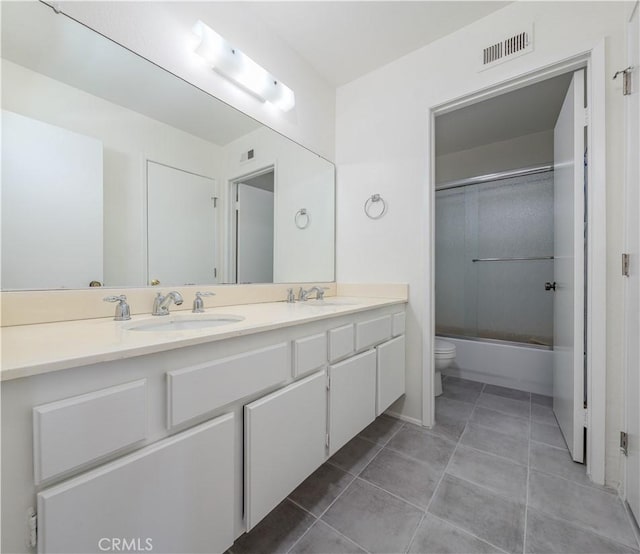 2142 S Mountain Ave, Ontario, CA 91762 - full bath with double vanity, shower / bath combination with glass door, and tile patterned floors
