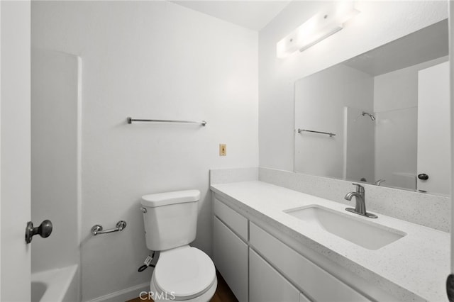 bathroom with toilet, vanity, and shower / bath combination