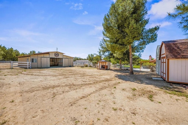 17985 Copper Queen Ln, Perris, CA 92570 - view of yard featuring an outbuilding and an exterior structure