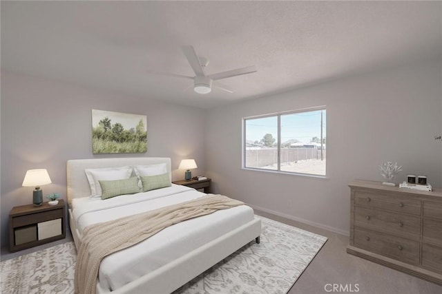 21918 Mohican Ave, Apple Valley, CA 92307 - carpeted bedroom with baseboards and a ceiling fan