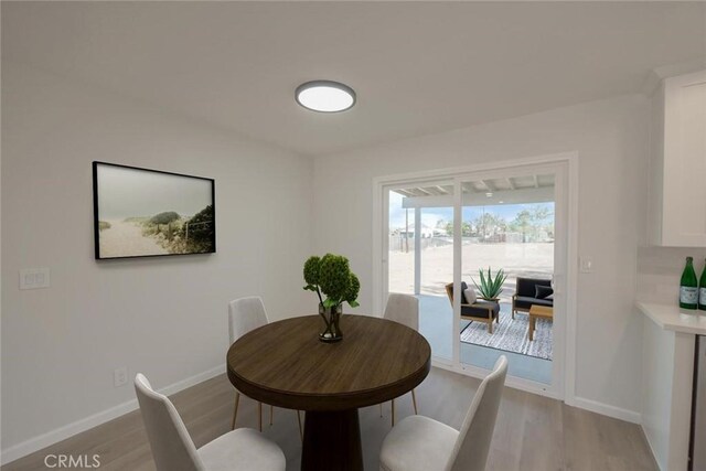 21918 Mohican Ave, Apple Valley, CA 92307 - dining space with light wood finished floors