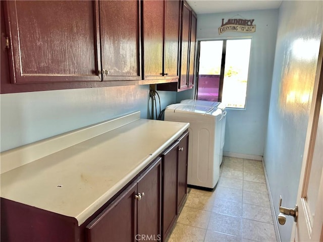 5408 Whitewood Ave, Lakewood, CA 90712 - washroom with cabinet space, separate washer and dryer, baseboards, and light tile patterned flooring