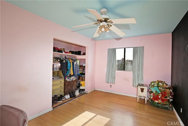5408 Whitewood Ave, Lakewood, CA 90712 - bedroom featuring wood finished floors, baseboards, a closet, and a ceiling fan