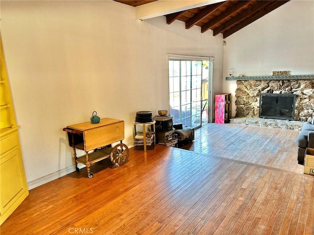 5408 Whitewood Ave, Lakewood, CA 90712 - living area featuring wood ceiling, hardwood / wood-style flooring, a fireplace, and baseboards
