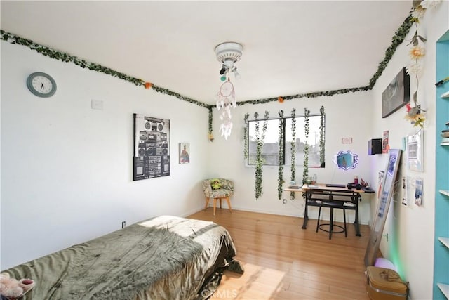 5408 Whitewood Ave, Lakewood, CA 90712 - bedroom with light wood-type flooring and baseboards