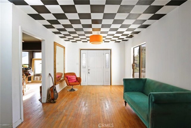 5408 Whitewood Ave, Lakewood, CA 90712 - foyer entrance featuring plenty of natural light, light wood-style floors, and baseboards