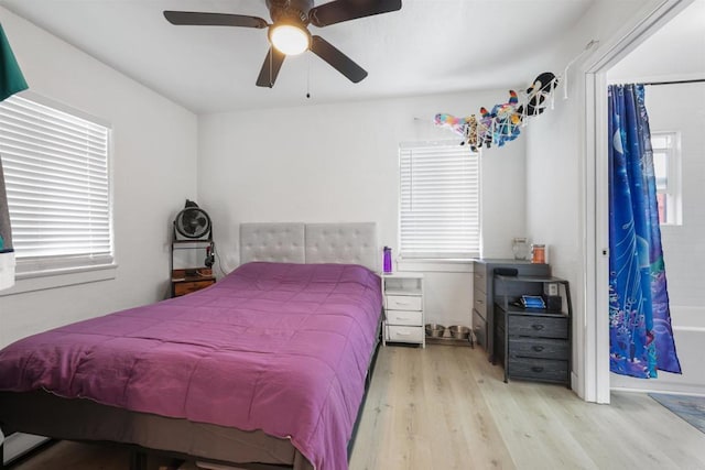 425961 Maryland St, San Diego, CA 92103 - bedroom featuring wood finished floors, multiple windows, and ceiling fan