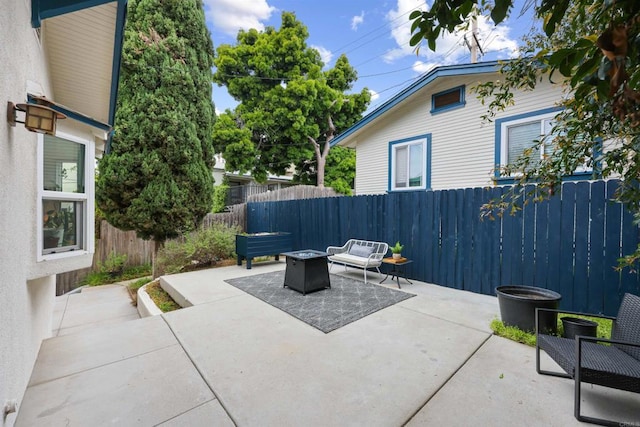 425961 Maryland St, San Diego, CA 92103 - view of patio with a fire pit and a fenced backyard