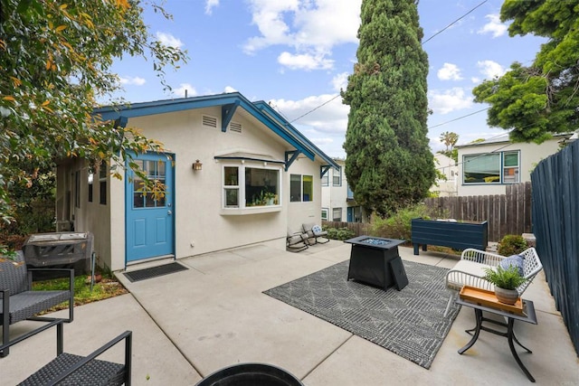 425961 Maryland St, San Diego, CA 92103 - view of patio with an outdoor fire pit and fence