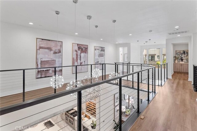 59 Dorado, Irvine, CA 92618 - hall featuring an upstairs landing, recessed lighting, and light wood-style floors