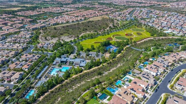 59 Dorado, Irvine, CA 92618 - aerial overview of property's location with a pool and nearby suburban area