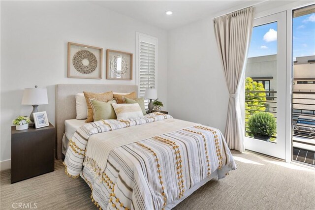 59 Dorado, Irvine, CA 92618 - carpeted bedroom with access to exterior and recessed lighting