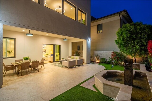59 Dorado, Irvine, CA 92618 - patio at twilight with outdoor lounge area, a patio area, and outdoor dining area