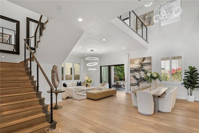 59 Dorado, Irvine, CA 92618 - living area with light wood-style flooring, stairway, recessed lighting, baseboards, and a chandelier