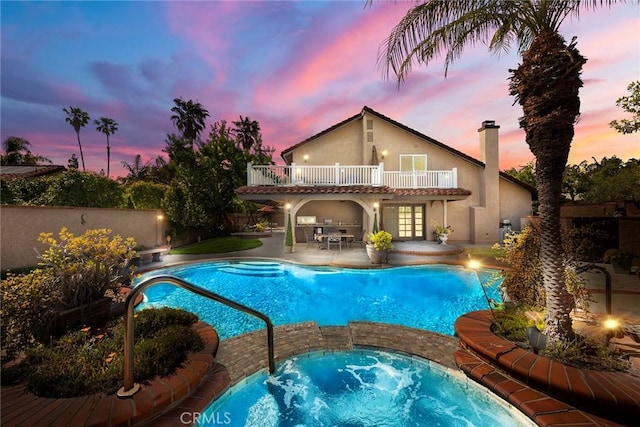 5034 Vista Montana, Yorba Linda, CA 92886 - view of swimming pool featuring an in-ground hot tub, a patio area, and french doors