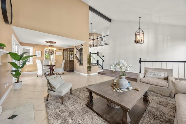 5034 Vista Montana, Yorba Linda, CA 92886 - living area with a chandelier, light tile patterned floors, stairs, high vaulted ceiling, and baseboards