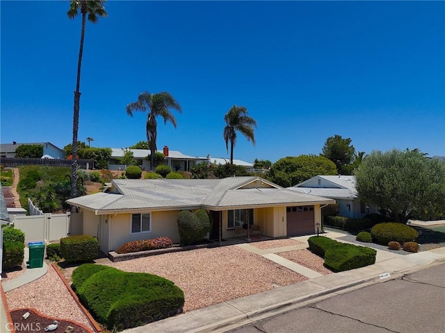 12488 Mantilla Rd, San Diego, CA 92128 - ranch-style house with an attached garage and concrete driveway