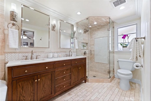 2618 N Louise St, Santa Ana, CA 92706 - full bath with crown molding, toilet, a stall shower, double vanity, and ceiling fan