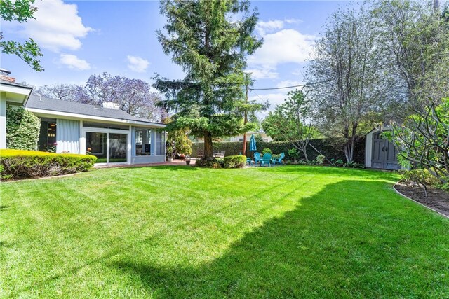 2618 N Louise St, Santa Ana, CA 92706 - view of yard with a storage shed and an outbuilding