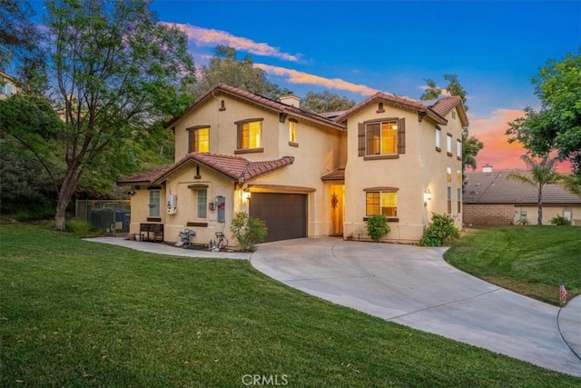 28335 Arroyo Ct, Castaic, CA 91384 - mediterranean / spanish home featuring a tile roof, concrete driveway, a garage, stucco siding, and a chimney