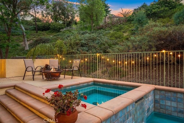 28335 Arroyo Ct, Castaic, CA 91384 - view of swimming pool with an outdoor fire pit, an in-ground hot tub, a patio, and fence