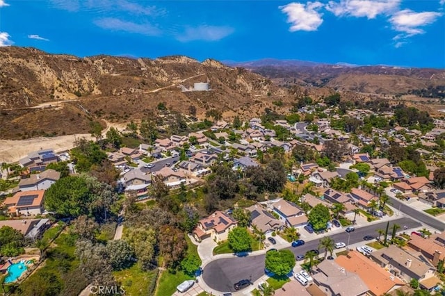 28335 Arroyo Ct, Castaic, CA 91384 - aerial view of property's location featuring a mountain backdrop and nearby suburban area