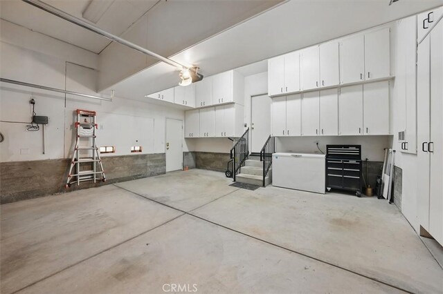29661 Cambridge Ave, Castaic, CA 91384 - garage featuring refrigerator
