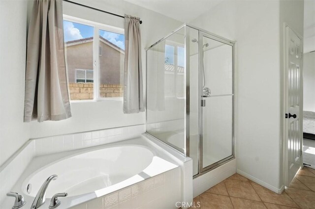 29661 Cambridge Ave, Castaic, CA 91384 - bathroom with a stall shower, tile patterned floors, and a garden tub