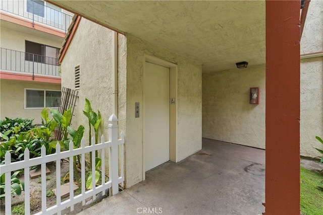 4591 Orange Ave Unit 306, Long Beach, CA 90807 - doorway to property with elevator and stucco siding
