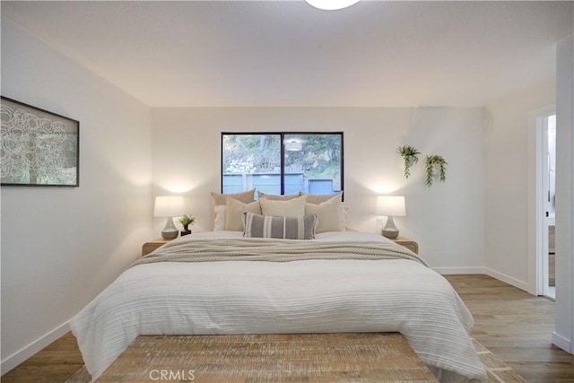 953 Sheffield St, Cambria, CA 93428 - bedroom with wood finished floors and baseboards