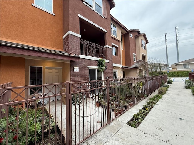 view of property featuring fence