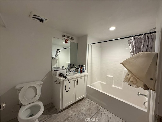 bathroom with toilet, bathtub / shower combination, vanity, and recessed lighting