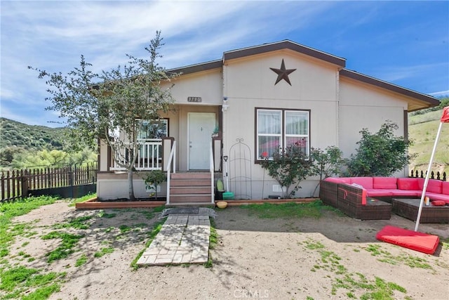 3770 Blue Ridge Rd, Creston, CA 93432 - view of front of house with outdoor lounge area, fence, and covered porch