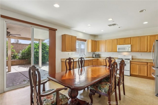 7055 Springtime Ave, Fontana, CA 92336 - dining area featuring recessed lighting, a ceiling fan, and light tile patterned floors
