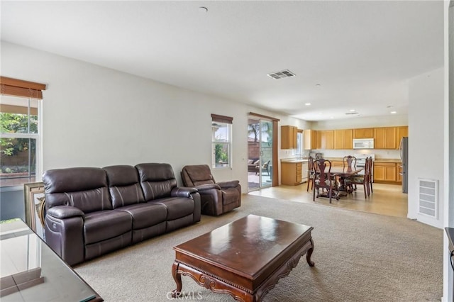 7055 Springtime Ave, Fontana, CA 92336 - living area with light carpet and recessed lighting