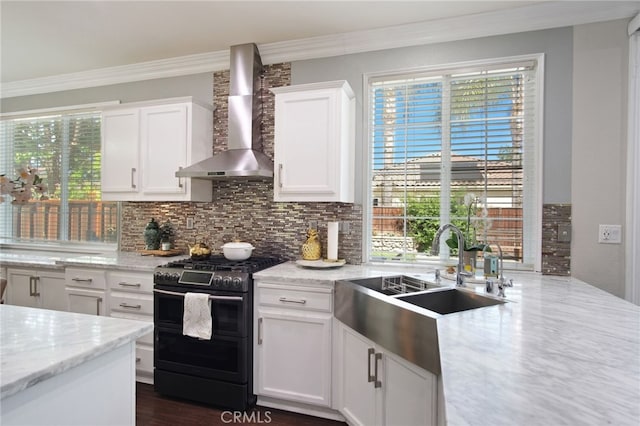 4885 Dandelion, Tracy, CA 95377 - kitchen featuring range with two ovens, wall chimney exhaust hood, crown molding, tasteful backsplash, and a sink