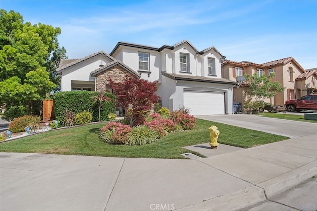 4885 Dandelion, Tracy, CA 95377 - view of front of home featuring stucco siding, stone siding, concrete driveway, an attached garage, and a tiled roof