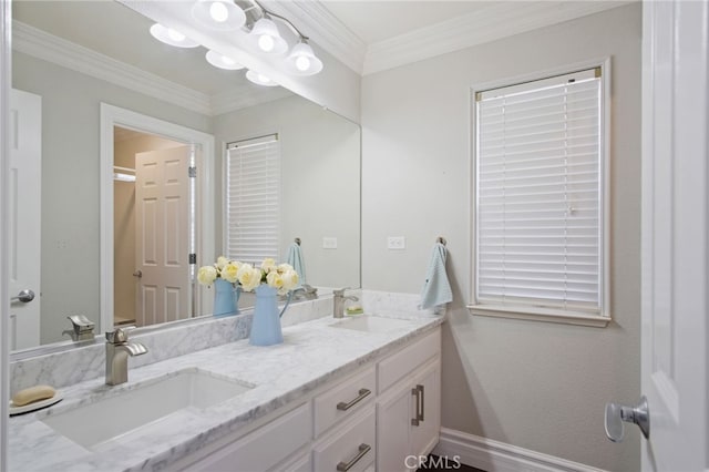 4885 Dandelion, Tracy, CA 95377 - bathroom with double vanity, crown molding, and baseboards