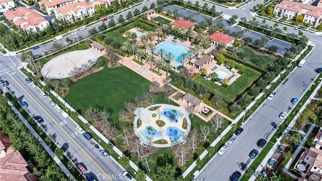 aerial view of property's location featuring a pool area